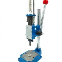 Presse a recouvrir les boutons